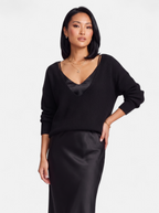 Women's black satin skirt and sweater set hero shot