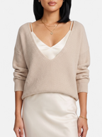 Women's cream satin skirt and sweater set detail shot