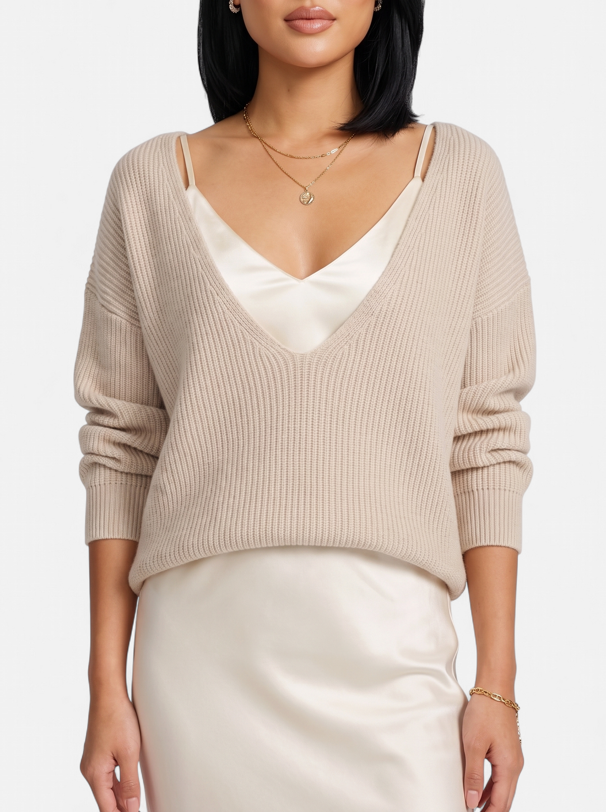 Women's cream satin skirt and sweater set detail shot