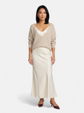 Women's cream satin skirt and sweater set full body shot