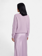 Women's lavender satin skirt and sweater set back shot