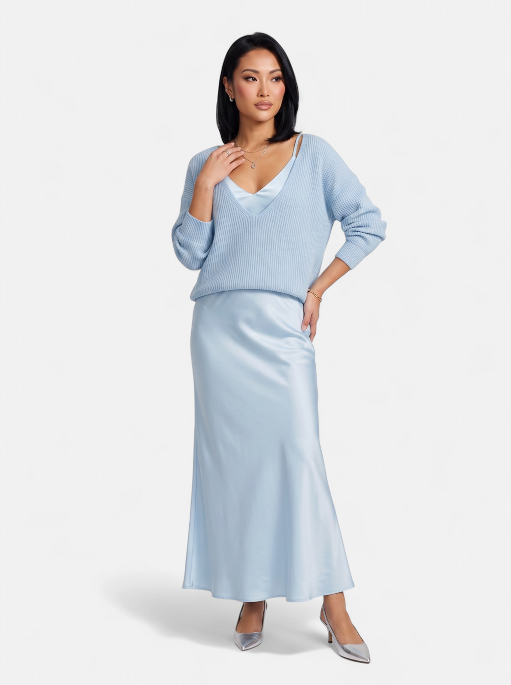 Women's light blue satin skirt and sweater set full body shot
