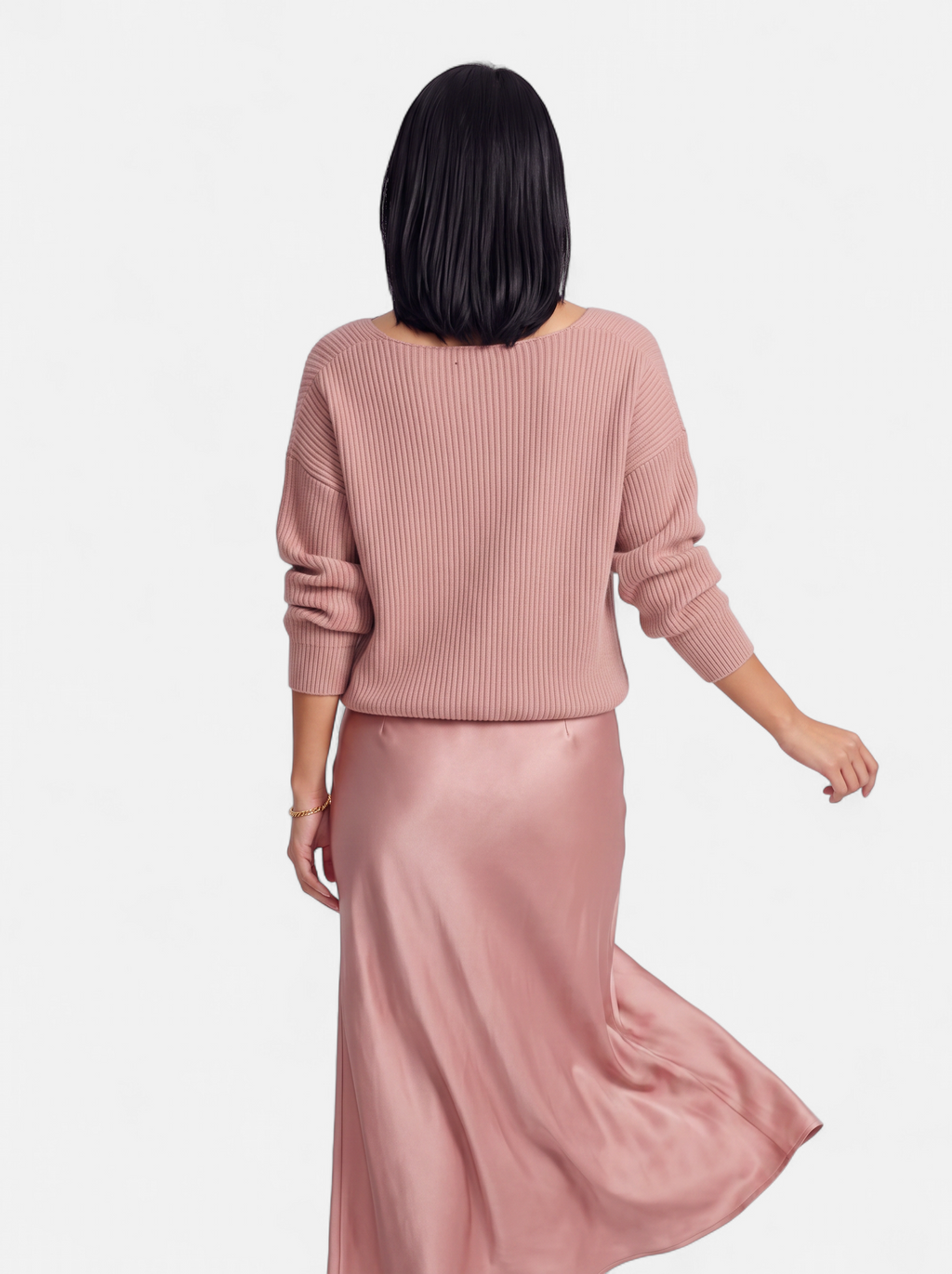 Women's pink satin skirt and sweater set back shot