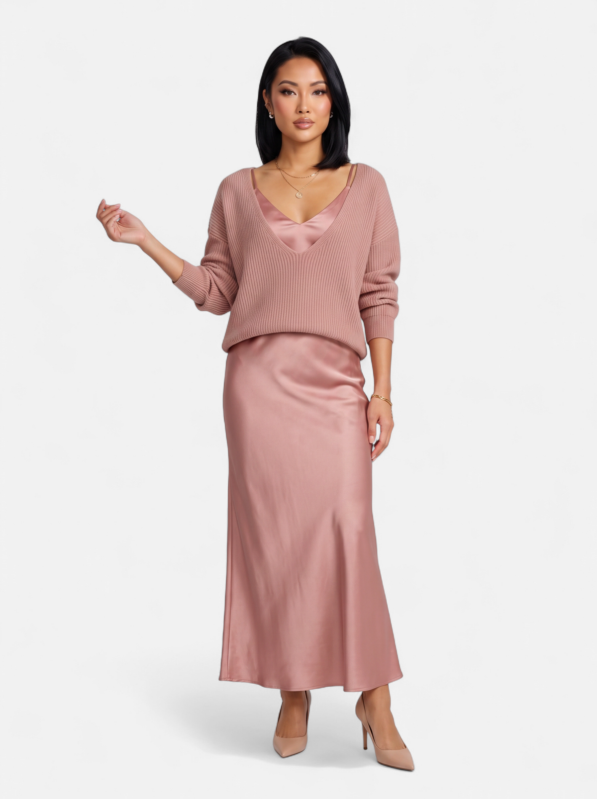 Women's pink satin skirt and sweater set full body shot
