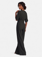 Women's black wrap v-neck jumpsuit back shot