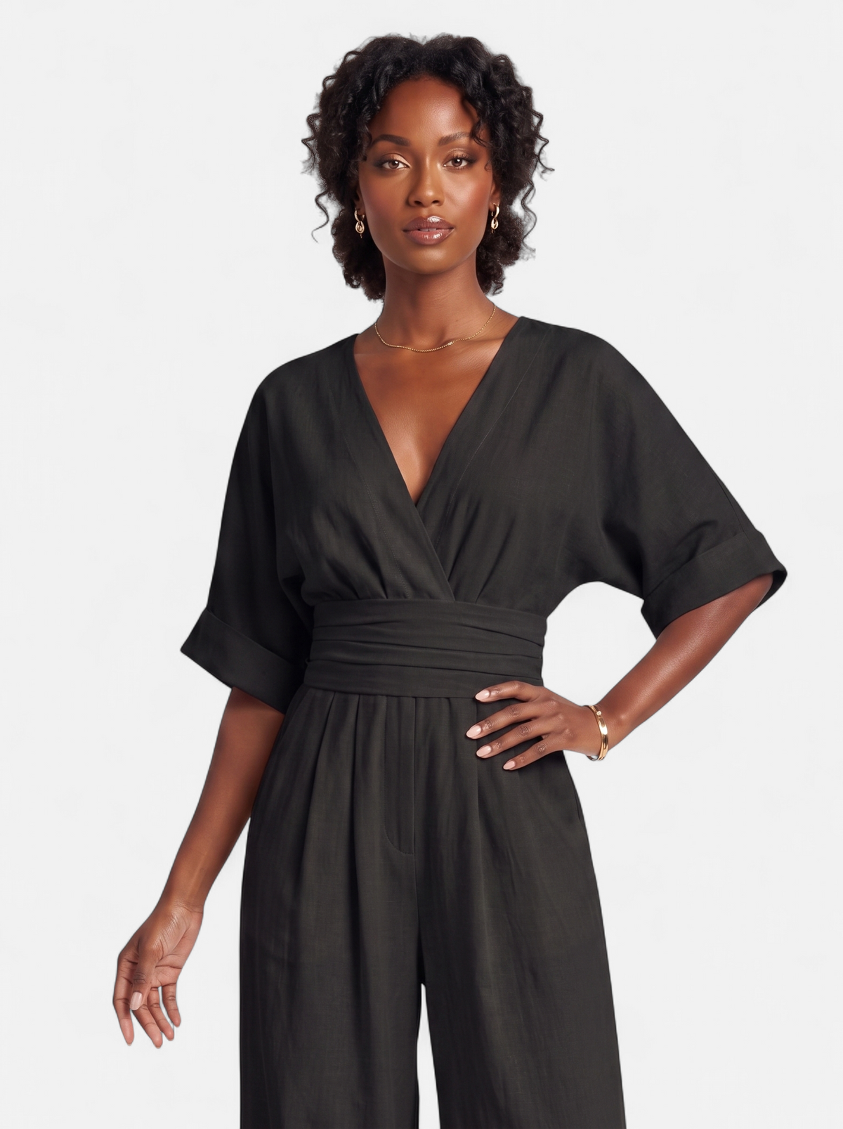 Women's black wrap v-neck jumpsuit hero shot