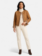 Women's beige faux fur motorcycle jacket full body shot