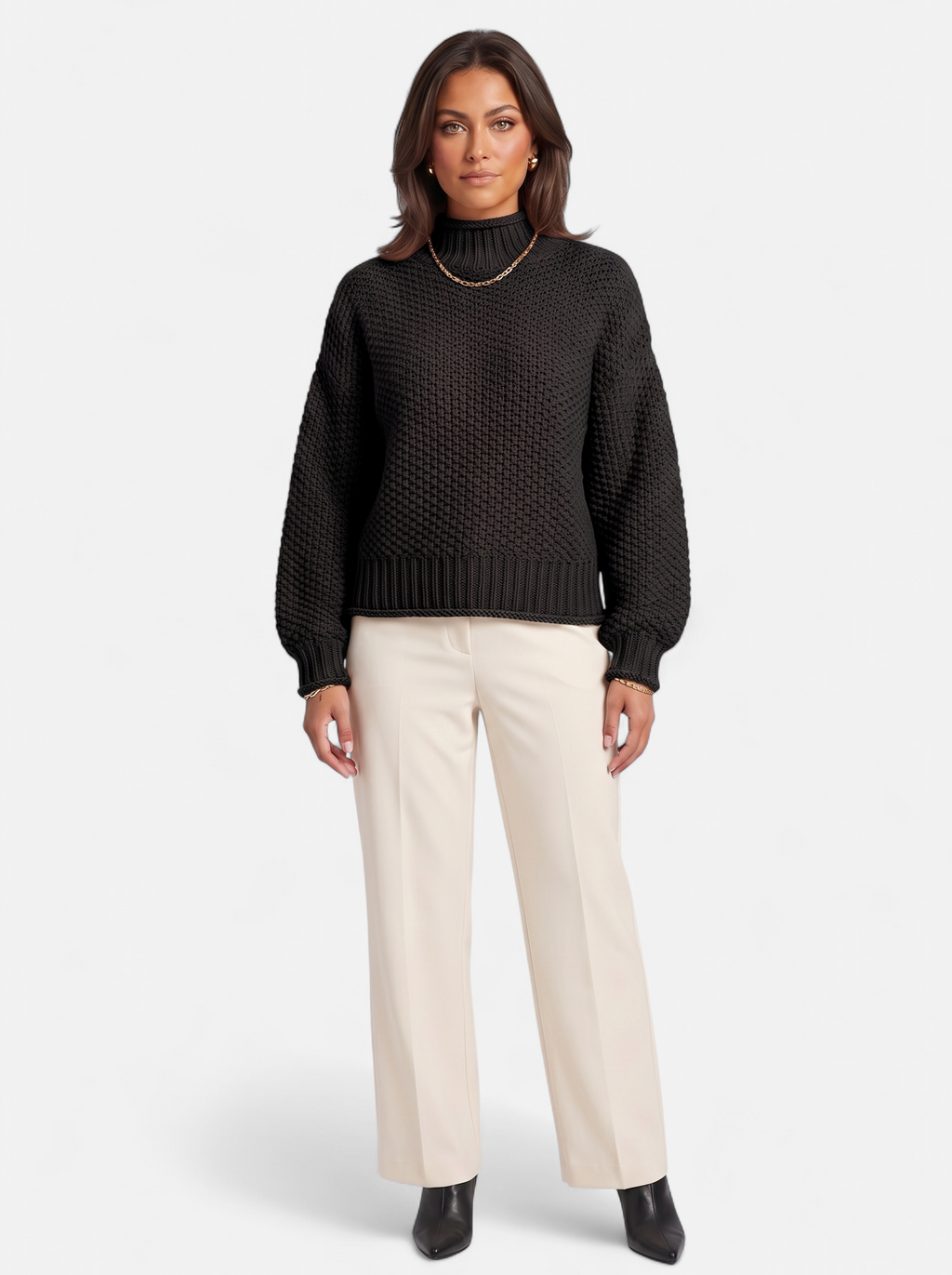 Women's black oversized turtleneck sweater full body shot