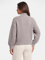 Women's gray oversized turtleneck sweater back shot