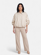 Women's beige oversized bomber jacket full body shot