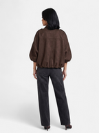 Women's brown oversized bomber jacket back shot