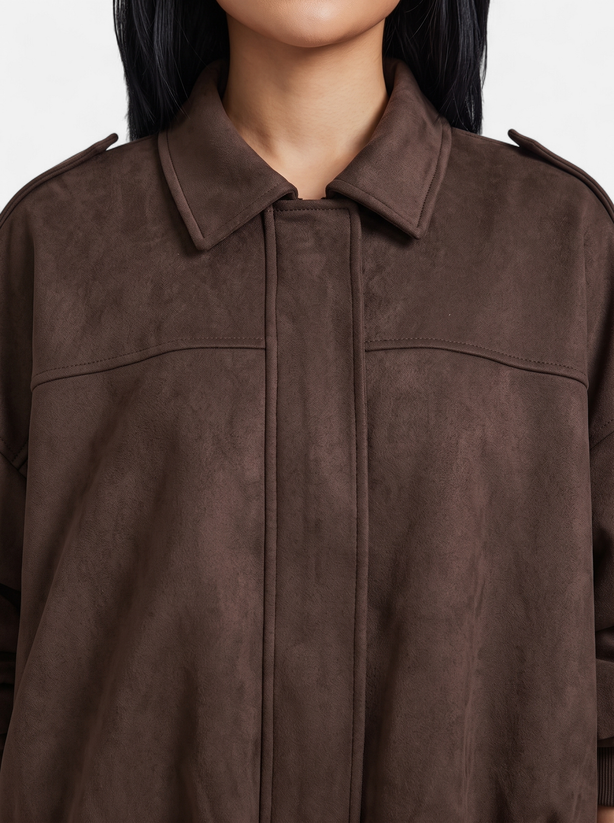 Women's brown oversized bomber jacket detail shot