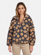 Women's yellow floral fleece half-zip jacket hero shot