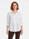 Women's white oversized linen button-up shirt hero shot