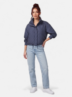 Women's blue polka dot bomber jacket full body shot