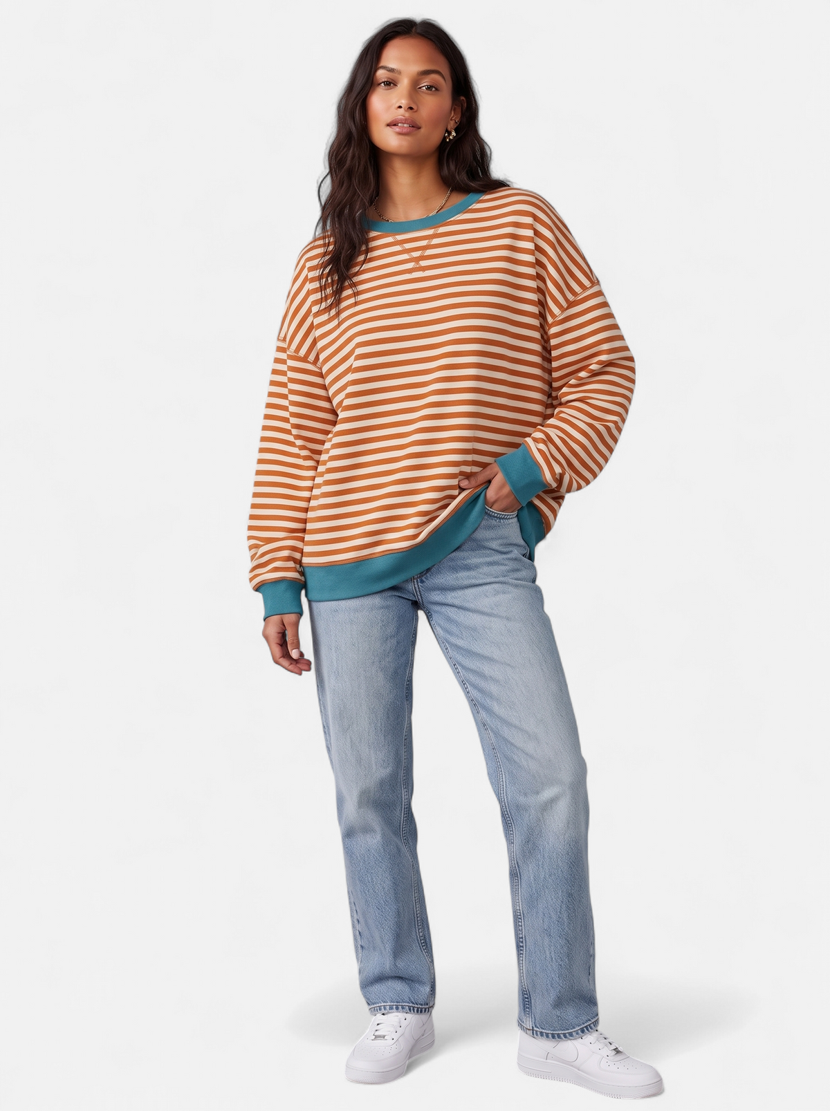 Women's orange striped sweatshirt with contrast trim full body shot