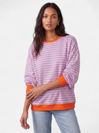 Women's multicolor pink and orange striped sweatshirt with contrast trim hero shot