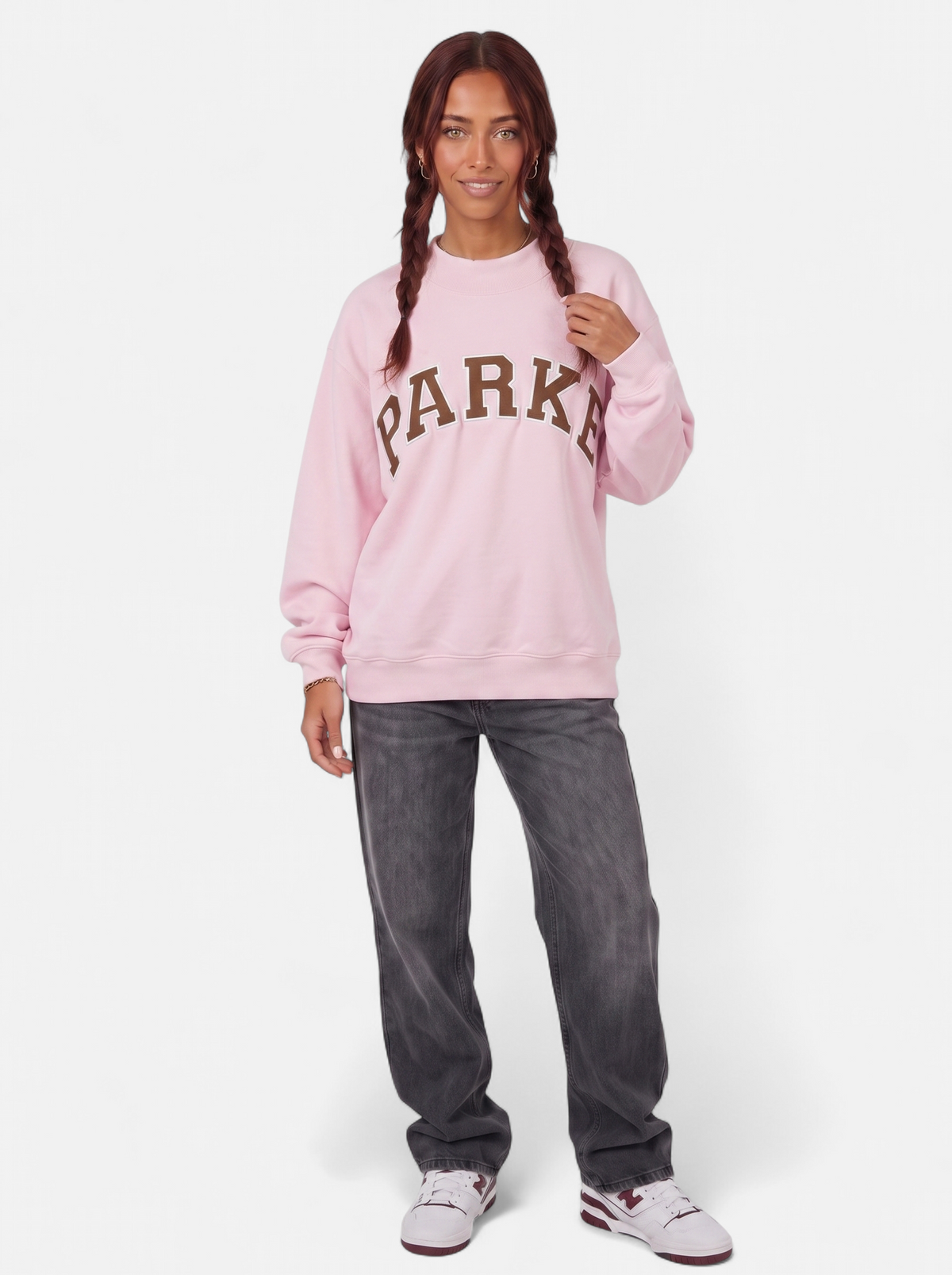 Women's pink oversized varsity sweatshirt full body shot