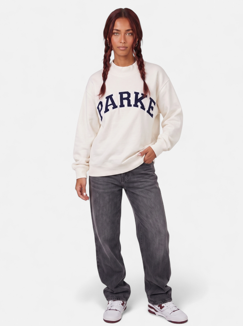 Women's white oversized varsity sweatshirt full body shot