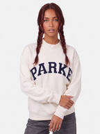 Women's white oversized varsity sweatshirt hero shot